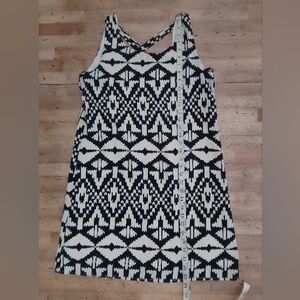 Black & White Patterned Top with Birdcage Logo Anthropologie